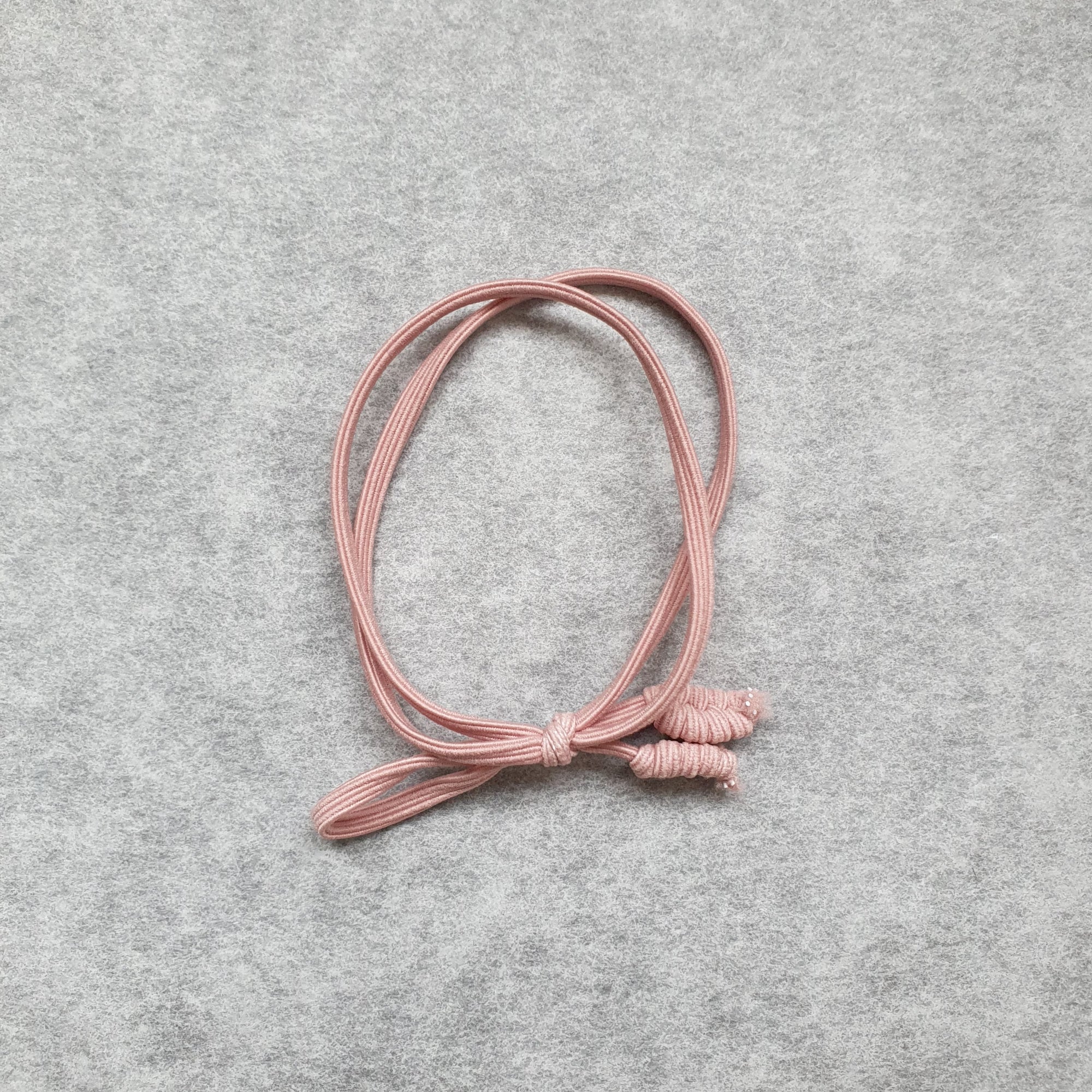 Armband - Haarelastiek Roze