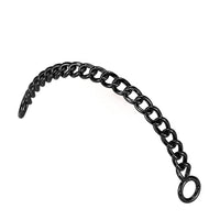 Zwarte piercing ketting van chirurgisch staal, geschikt om twee piercings te verbinden.